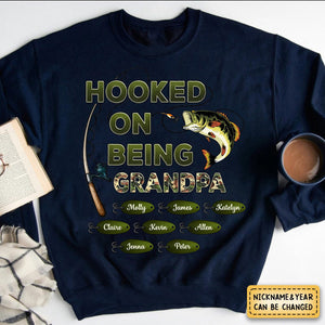 Personalized Hooked On Being Dad/Grandpa Fishing Camouflage Sweatshirt