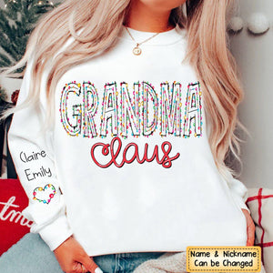 Gigi Claus Christmas lights And Grandkids Personalized Christmas Merry Sweatshirt