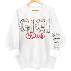 Gigi Claus Christmas lights And Grandkids Personalized Christmas Merry Sweatshirt